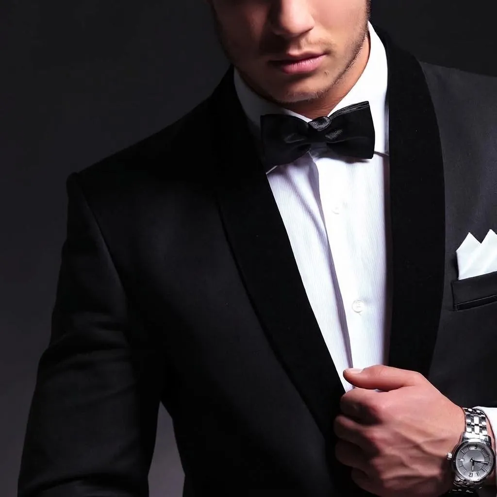 A black tuxedo jacket with a bow tie