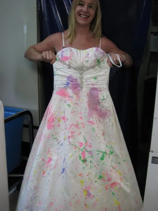 Paint-stained satin gown, before cleaning