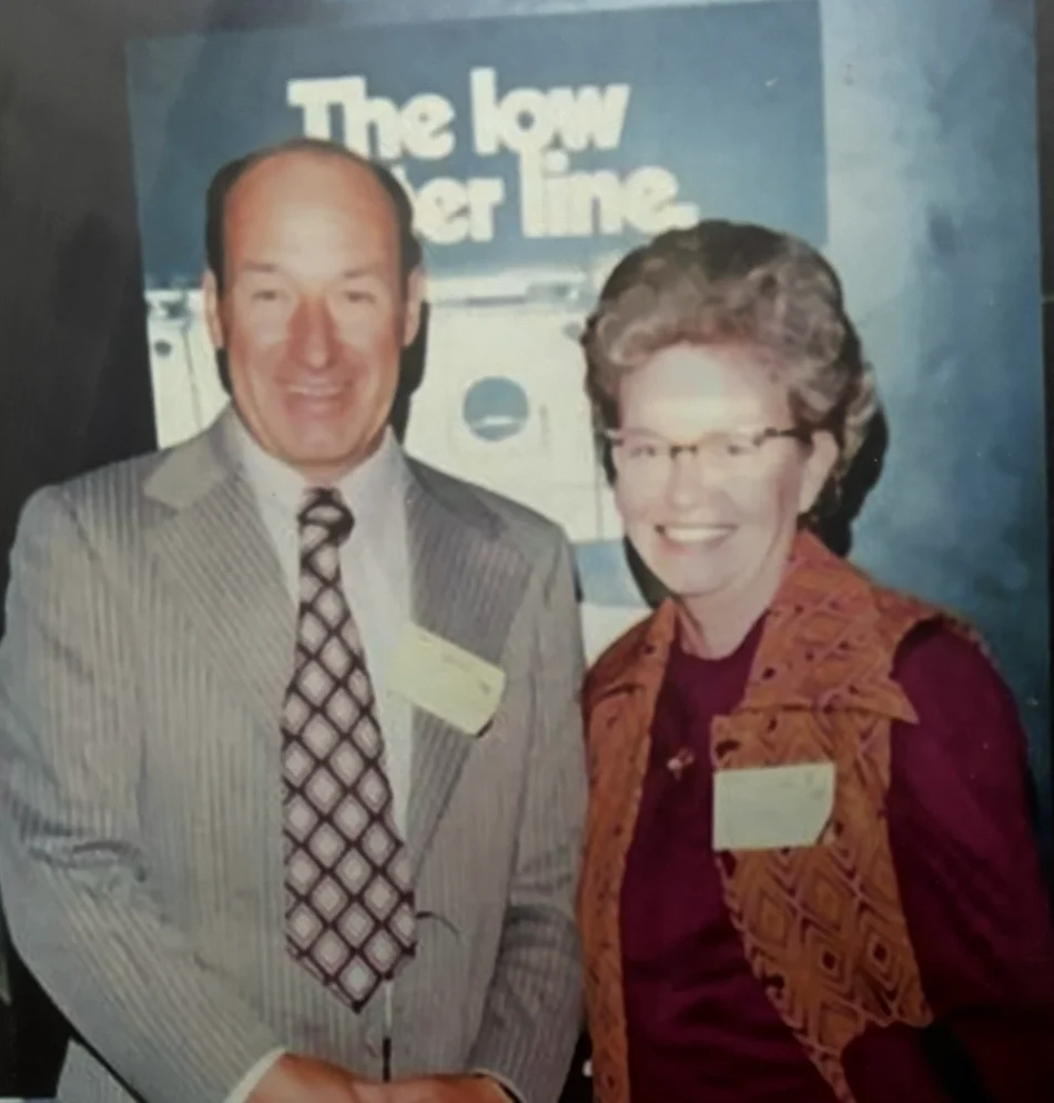 Two members of Faye's family at a laundry industry event